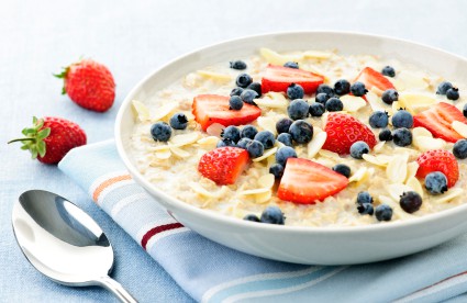 Bowl of oatmeal with berries | Winners Drink Milk!