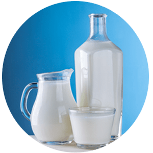 Three glass containers of milk